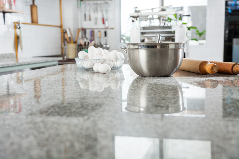 Mixing Bowl With Eggs And Rolling Pin On Countertop Kitchen